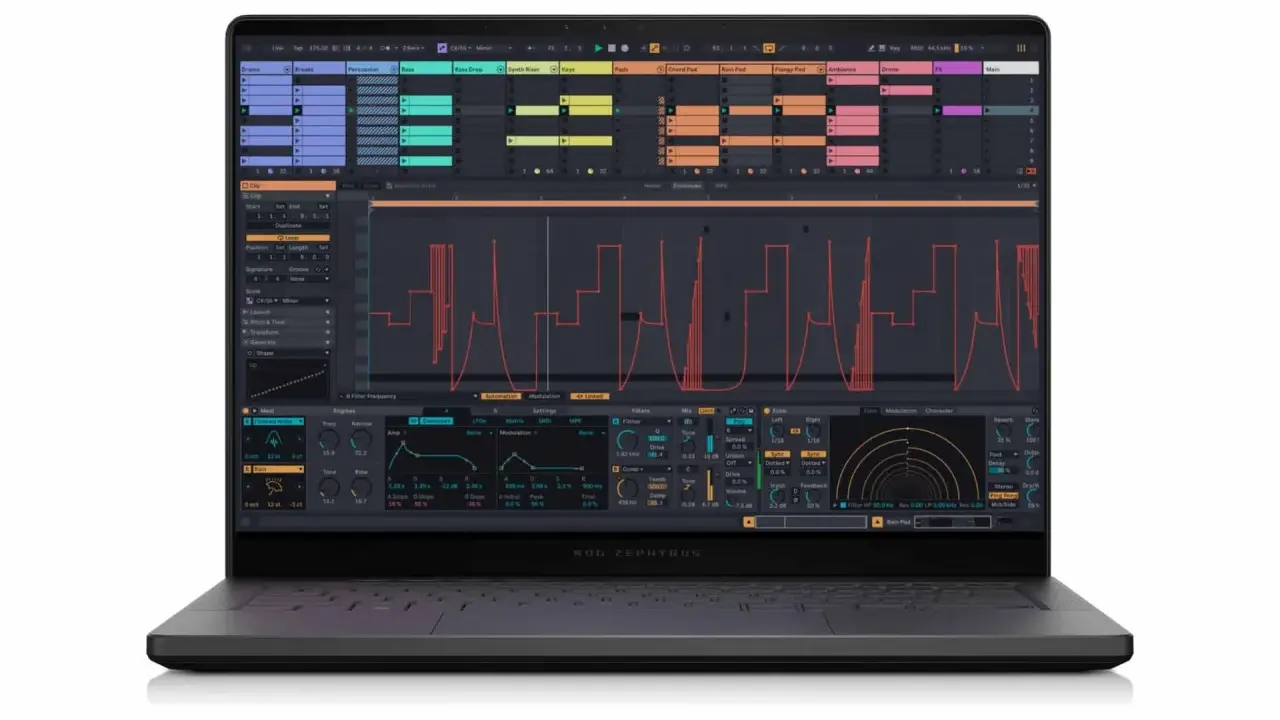 Un laptop ROG Zephyrus affiche un logiciel de production musicale avec des pistes audio et des formes d'onde complexes.