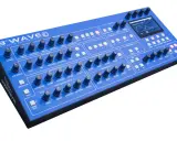 Synthétiseur bleu 3rd Wave, idéal pour apprendre à mixer de la techno. Boutons, molettes et écran pour créer des sons.
