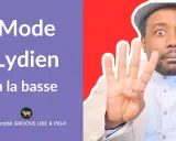 Un homme montre quatre doigts, avec le texte "Mode Lydien à la basse" sur fond violet.