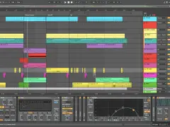 Vue d'écran d'Ableton Live montrant une session complexe avec plusieurs pistes audio et MIDI, idéale pour un **ableton tutorial**.