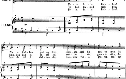 Partition de musique avec des notes et des paroles en français.