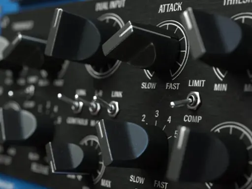 Gros plan sur les boutons et interrupteurs d'un compresseur audio. Réglages d'attaque, de seuil et de ratio sur cet équipement de studio.